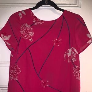 Pink blouse criss cross back
